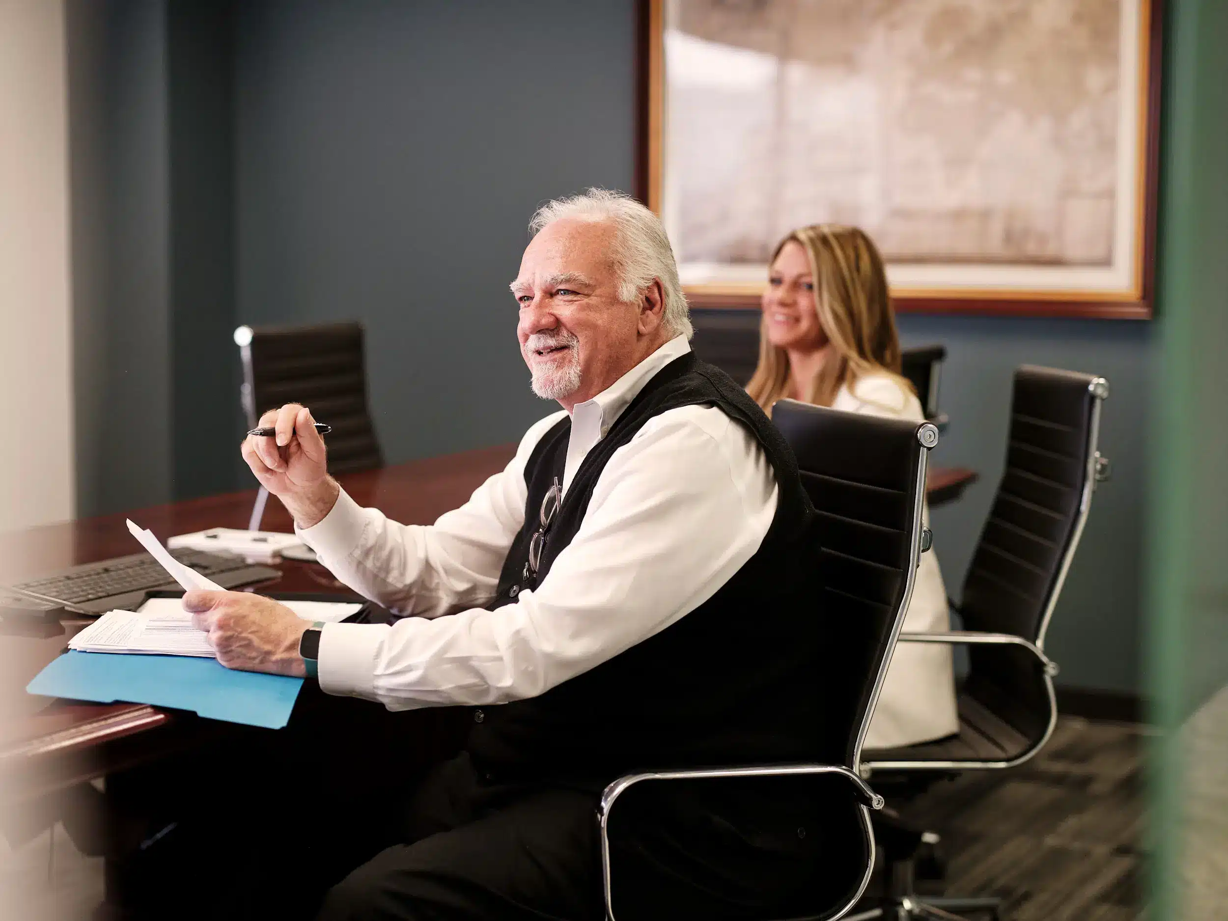 Two people working at a table